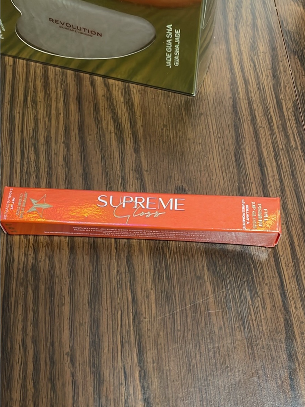 Jeffree Star Supreme Gloss - Orange Shimmery Packaging